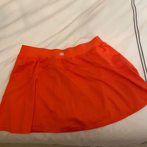 Tail neon orange tennis skirt. Like new condition